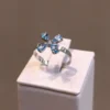 Anel Flor Topázio Azul 4 Pétalas - Image 3